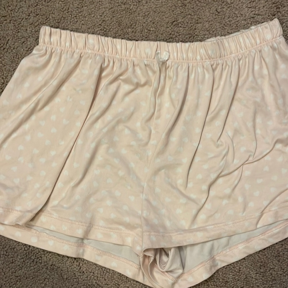 Baby pink sleep shorts with white hearts